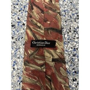 Vintage Silk Christian Dior Necktie Featuring A Maroon Abstract Pattern